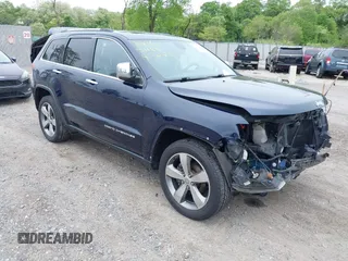 2014 Jeep Grand Cherokee Limited z VIN 1C4RJFBG1EC554462, wystawiony jako IAAI lot #42186110 z przebiegiem 205 149 mil mil oraz . Historia ofert i sprzedaży dostępna na DreamBid. Obrazek 1.