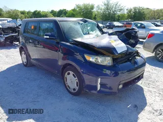 2014 Scion xB with VIN JTLZE4FE8EJ058219, listed as a IAAI auction lot 42049238 with 1 mi miles. Bid and sale history available at carsss.com. Image 1.