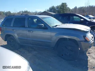2007 Jeep Grand Cherokee Laredo with VIN 1J8GR48K37C652484, listed as a IAAI auction lot 41909226 with 134,099 mi miles. Bid and sale history available at carsss.com. Image 14.