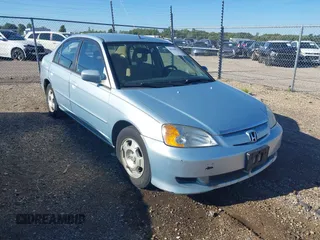 2003 Honda Civic Hybrid with VIN JHMES95673S023624, listed as a IAAI auction lot 40258910 with 181,949 mi miles. Bid and sale history available at carsss.com. Image 1.