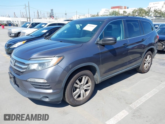 2016 Honda Pilot LX with VIN 5FNYF5H1XGB032851, listed as a IAAI auction lot 41998989 with 68,882 mi miles and . Bid and sale history available at DreamBid. Image 2.