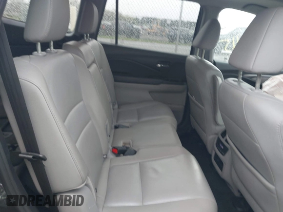 2017 Honda Pilot EX-L with VIN 5FNYF6H5XHB029443, listed as a IAAI auction lot 41992115 with 154,399 mi miles and . Bid and sale history available at DreamBid. Image 8.
