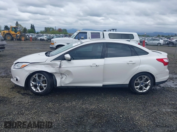 2014 Ford Focus Titanium with VIN 1FADP3J27EL142095, listed as a IAAI auction lot 42004419 with 139,515 mi miles. Bid and sale history available at carsss.com. Image 14.