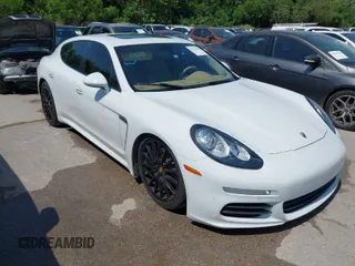 2014 Porsche Panamera z VIN WP0AA2A74EL013252, wystawiony jako IAAI lot #42031010 z przebiegiem 78 890 mil mil oraz . Historia ofert i sprzedaży dostępna na DreamBid. Obrazek 1.