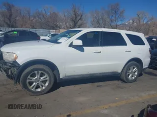 2013 Dodge Durango Special Service with VIN 1C4SDJFT8DC658044, listed as a IAAI auction lot 41871863 with 214,545 mi miles and . Bid and sale history available at carsss.com. Image 15.