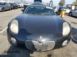 2007 Pontiac Solstice z VIN 1G2MB35B17Y105220, wystawiony jako Copart lot #52199785 z przebiegiem 348 414 mil mil oraz Czysty tytuł • Clean title. Historia ofert i sprzedaży dostępna na DreamBid. Obrazek 5.
