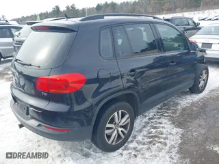 2016 Volkswagen Tiguan R-Line with VIN WVGAV7AX0GW598930, listed as a IAAI auction lot 41525554 with 142,248 mi miles. Bid and sale history available at carsss.com. Image 4.