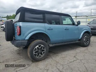2023 Ford Bronco z VIN 1FMEE5DP9PLB17477, wystawiony jako Copart lot #58829615 z przebiegiem 22 069 mil mil oraz Szkoda całkowita • Salvage title. Historia ofert i sprzedaży dostępna na DreamBid. Obrazek 3.