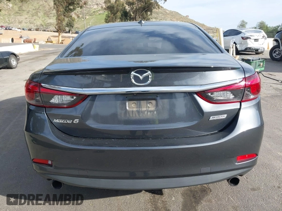2016 Mazda Mazda6 i Grand Touring with VIN JM1GJ1W57G1441102, listed as a IAAI auction lot 41687057 with 144,876 mi miles. Bid and sale history available at carsss.com. Image 16.