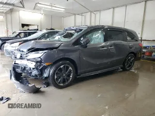 2023 Honda Odyssey Elite with VIN 5FNRL6H98PB056770, listed as a Copart auction lot 56984055 with Not provided miles and Salvage title. Bid and sale history available at DreamBid. Image 1.