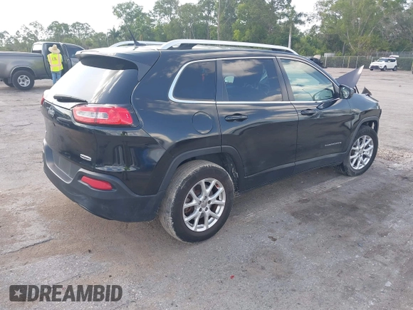 2014 Jeep Cherokee Altitude with VIN 1C4PJMCB5EW146365, listed as a IAAI auction lot 42021350 with 120,652 mi miles and . Bid and sale history available at DreamBid. Image 4.