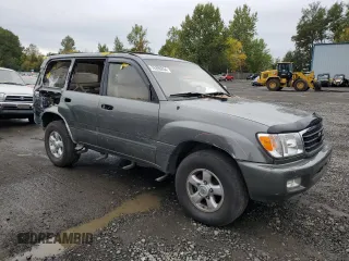 2000 Toyota Land Cruiser with VIN JT3HT05J7Y0084006, listed as a Copart auction lot 76390254 with 142,620 mi miles and Salvage Title. Bid and sale history available at carsss.com. Image 4.