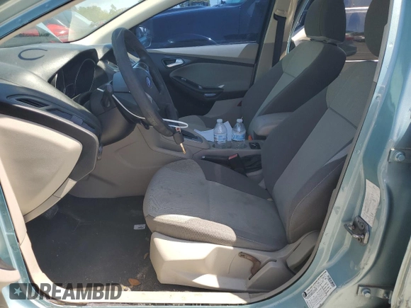 2012 Ford Focus SE with VIN 1FAHP3F29CL428201, listed as a Copart auction lot 52566905 with 209,909 mi miles and Salvage title. Bid and sale history available at DreamBid. Image 7.
