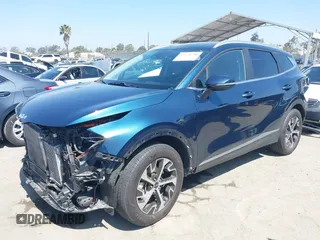 2023 Kia Sportage EX with VIN KNDPVCAG4P7018273, listed as a IAAI auction lot 42374790 with 25,814 mi miles and . Bid and sale history available at DreamBid. Image 18.