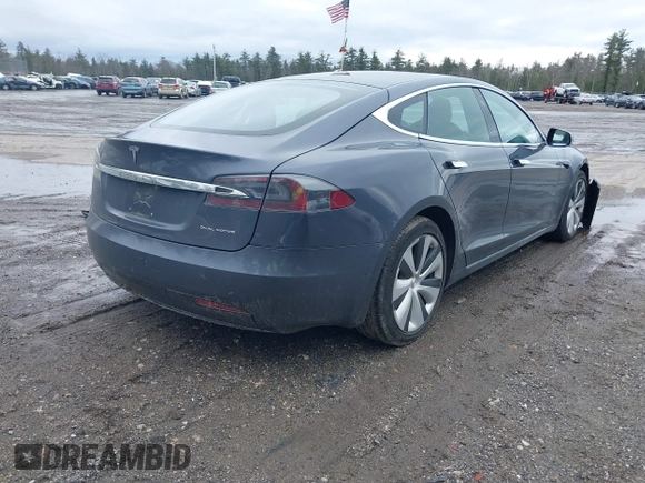 2020 Tesla Model S Long Range z VIN 5YJSA1E26LF413519, wystawiony jako IAAI lot #41742512 z przebiegiem 40 765 mil mil oraz . Historia ofert i sprzedaży dostępna na DreamBid. Obrazek 4.