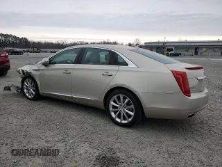 2014 Cadillac XTS Premium with VIN 2G61P5S32E9195930, listed as a Copart auction lot 48320165 with 31,026 mi miles and Salvage Title. Bid and sale history available at DreamBid. Image 2.