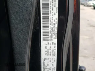 2013 Jeep Wrangler Unlimited Sport with VIN 1C4BJWDG0DL560265, listed as a Copart auction lot 58444045 with 111,354 mi miles and Salvage title. Bid and sale history available at DreamBid. Image 13.