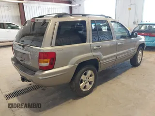 2001 Jeep Grand Cherokee Limited with VIN 1J4GW58S01C566671, listed as a IAAI auction lot 42193545 with 204,887 mi miles and . Bid and sale history available at DreamBid. Image 4.