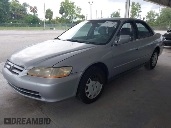 2001 Honda Accord LX with VIN 1HGCG55401A063548, listed as a IAAI auction lot 42651792 with 215,058 mi miles and . Bid and sale history available at DreamBid. Image 2.