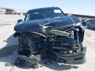 2014 Chevrolet Silverado 1500 LT with VIN 3GCUKREH8EG210945, listed as a IAAI auction lot 41718435 with 106,320 mi miles and . Bid and sale history available at DreamBid. Image 12.