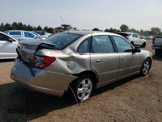 2003 Saturn LS z VIN 1G8JU54F63Y520157, wystawiony jako Copart lot #65477434 z przebiegiem 130 515 mil mil oraz Szkody całkowita. Historia ofert i sprzedaży dostępna na DreamBid. Obrazek 3.