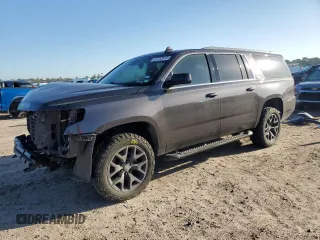 2017 Chevrolet Suburban LT with VIN 1GNSKHKC1HR226569, listed as a Copart auction lot 47752515 with 211,919 mi miles and Salvage Title. Bid and sale history available at carsss.com. Image 1.