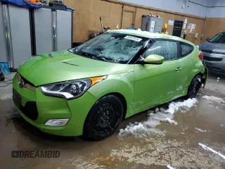2012 Hyundai Veloster w/Gray Int z VIN KMHTC6AD1CU059480, wystawiony jako Copart lot #86882034 z przebiegiem 146 464 mil mil oraz Czysty tytuł • Clean title. Historia ofert i sprzedaży dostępna na DreamBid. Obrazek 1.