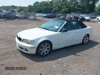 2006 BMW 3 Series 325Ci with VIN WBABW33436PX84629, listed as a IAAI auction lot 39878279 with 999,999 mi miles. Bid and sale history available at carsss.com. Image 2.