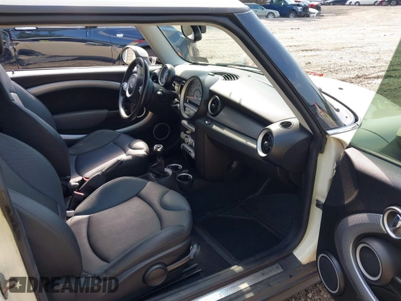 2010 MINI Hardtop S with VIN WMWMF7C55ATX44898, listed as a IAAI auction lot 42727762 with 131,845 mi miles and . Bid and sale history available at DreamBid. Image 5.
