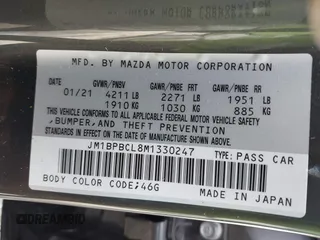 2021 Mazda 3 Preferred with VIN JM1BPBCL8M1330247, listed as a IAAI auction lot 42491066 with Not provided miles and . Bid and sale history available at DreamBid. Image 9.