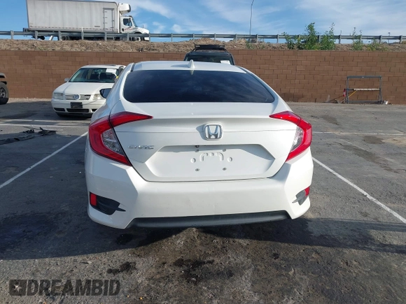 2017 Honda Civic EX z VIN 2HGFC2F76HH573639, wystawiony jako IAAI lot #41807311 z przebiegiem 140 431 mil mil oraz . Historia ofert i sprzedaży dostępna na DreamBid. Obrazek 16.