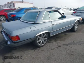 1985 Mercedes-Benz 380 z VIN WDBBA45C5FA029222, wystawiony jako IAAI lot #41658132 z przebiegiem 129 548 mil mil oraz . Historia ofert i sprzedaży dostępna na DreamBid. Obrazek 4.