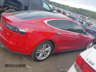 2013 Tesla Model S with VIN 5YJSA1CN1DFP09756, listed as a IAAI auction lot 41921720 with 94,770 mi miles. Bid and sale history available at carsss.com. Image 13.