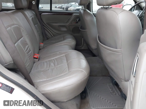2002 Jeep Grand Cherokee Limited with VIN 1J8GX58N42C283956, listed as a IAAI auction lot 41553997 with 214,388 mi miles and . Bid and sale history available at DreamBid. Image 8.