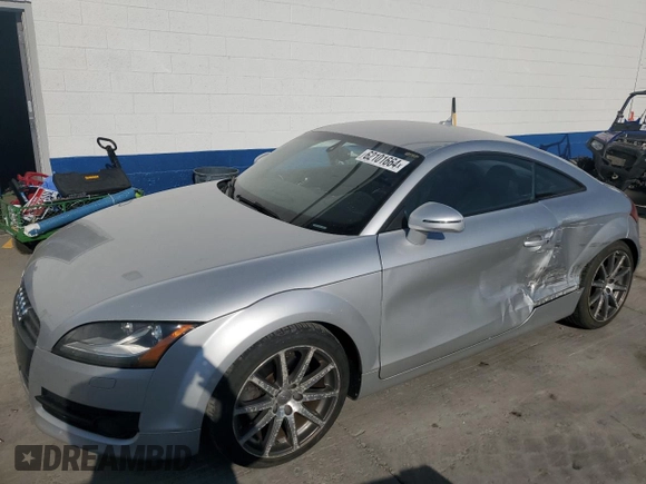 2009 Audi TT z VIN TRUKF38J391020407, wystawiony jako Copart lot #62101664 z przebiegiem 91 585 mil mil oraz Szkoda całkowita • Salvage title. Historia ofert i sprzedaży dostępna na DreamBid. Obrazek 1.