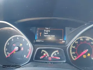 2015 Ford Focus ST with VIN 1FADP3L98FL207998, listed as a IAAI auction lot 41880849 with 203,571 mi miles. Bid and sale history available at carsss.com. Image 7.