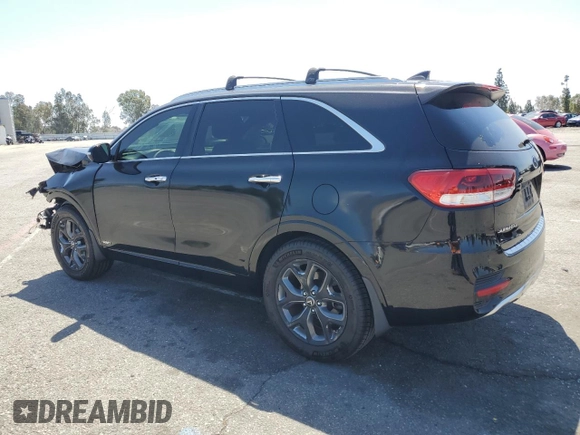 2016 Kia Sorento SXL z VIN 5XYPKDA19GG016449, wystawiony jako Copart lot #56943845 z przebiegiem 72 350 mil mil oraz Szkoda całkowita • Salvage title. Historia ofert i sprzedaży dostępna na DreamBid. Obrazek 2.