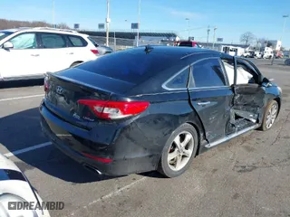 2016 Hyundai Sonata 2.4L Sport with VIN 5NPE34AF1GH410309, listed as a IAAI auction lot 38677619 with 233,330 mi miles. Bid and sale history available at carsss.com. Image 15.