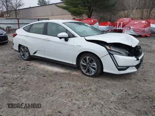 2021 Honda Clarity Touring z VIN JHMZC5F37MC001310, wystawiony jako IAAI lot #40843648 z przebiegiem 166 619 mil mil oraz . Historia ofert i sprzedaży dostępna na DreamBid. Obrazek 1.