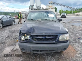 1999 Ford Explorer XL z VIN 1FMDU34X5XUC08663, wystawiony jako IAAI lot #42385444 z przebiegiem 177 387 mil mil oraz . Historia ofert i sprzedaży dostępna na DreamBid. Obrazek 12.