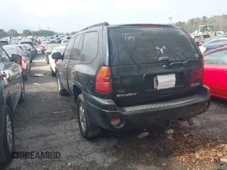 2006 GMC Envoy SLT with VIN 1GKDS13S562199496, listed as a IAAI auction lot 41463065 with 219,473 mi miles. Bid and sale history available at carsss.com. Image 3.