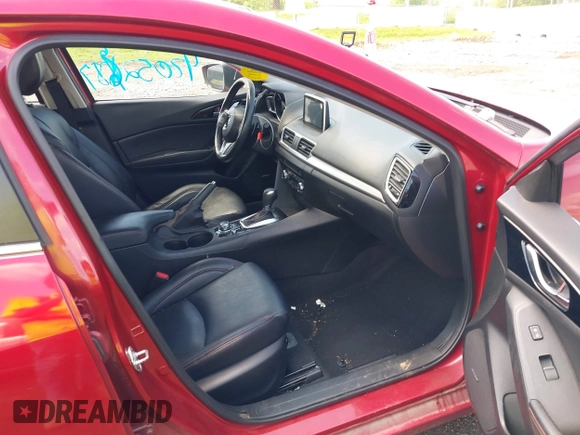 2014 Mazda 3 S Touring with VIN JM1BM1L36E1139818, listed as a IAAI auction lot 42129839 with 134,397 mi miles and . Bid and sale history available at DreamBid. Image 5.
