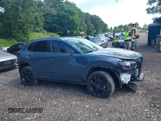 2023 Mazda CX-30 S Preferred z VIN 3MVDMBCM4PM558181, wystawiony jako IAAI lot #42589333 z przebiegiem 12 384 mil mil oraz . Historia ofert i sprzedaży dostępna na DreamBid. Obrazek 13.