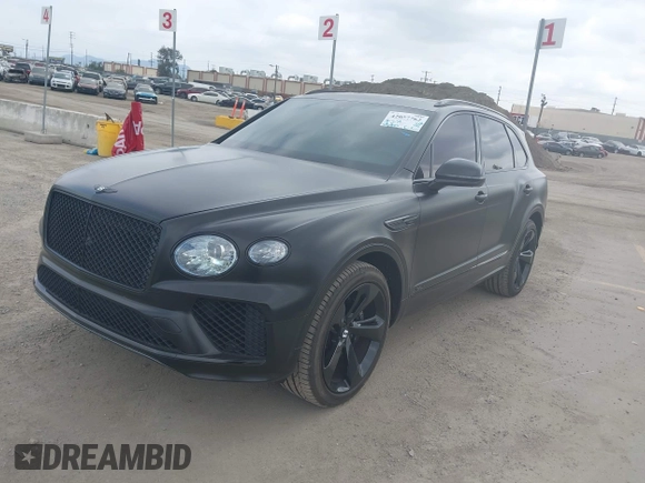 2021 Bentley Bentayga V8 z VIN SJAAM2ZV5MC038171, wystawiony jako IAAI lot #42057762 z przebiegiem 25 973 mil mil oraz . Historia ofert i sprzedaży dostępna na DreamBid. Obrazek 18.