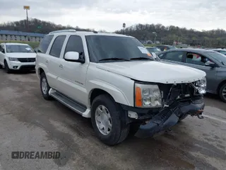 2005 Cadillac Escalade z VIN 1GYEK63N25R190908, wystawiony jako IAAI lot #41882135 z przebiegiem 243 333 mil mil oraz . Historia ofert i sprzedaży dostępna na DreamBid. Obrazek 1.