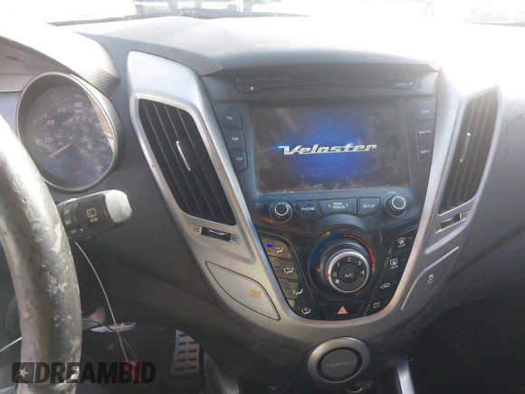 2013 Hyundai Veloster w/Gray Int with VIN KMHTC6AD4DU140121, listed as a IAAI auction lot 41410252 with 202,596 mi miles and . Bid and sale history available at DreamBid. Image 14.