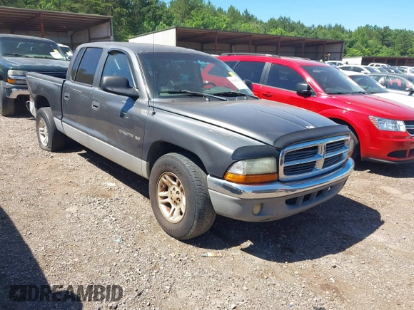 2001 Dodge Dakota Sport z VIN 1B7HL2ANX1S297770, wystawiony jako IAAI lot #42309715 z przebiegiem 279 458 mil mil oraz . Historia ofert i sprzedaży dostępna na DreamBid. Obrazek 1.