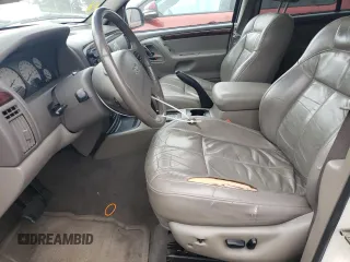 2004 Jeep Grand Cherokee Limited с VIN 1J4GW58N14C208543, выставлен на аукционе Copart как лот 64624035 с пробегом 144 362 миль миль и Списание • Salvage title. История ставок и продаж доступна на DreamBid. Изображение 7.