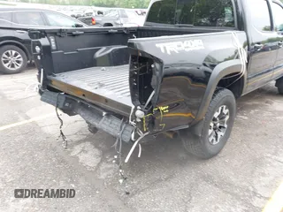 2021 Toyota Tacoma SR with VIN 3TMCZ5AN0MM417261, listed as a IAAI auction lot 42240693 with 38,625 mi miles and . Bid and sale history available at DreamBid. Image 21.