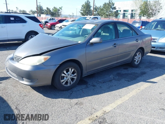 2005 Toyota Camry LE with VIN 4T1BF32K25U603812, listed as a IAAI auction lot 41740671 with 242,316 mi miles and . Bid and sale history available at DreamBid. Image 2.